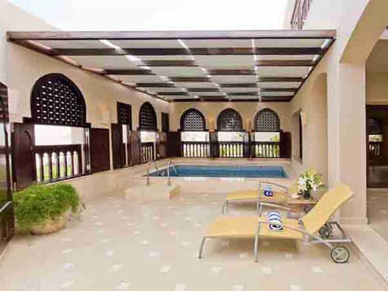 فندق ومنتجع ميرامار شاطئ العقة المظهر الخارجي الصورة The pool at the hotel